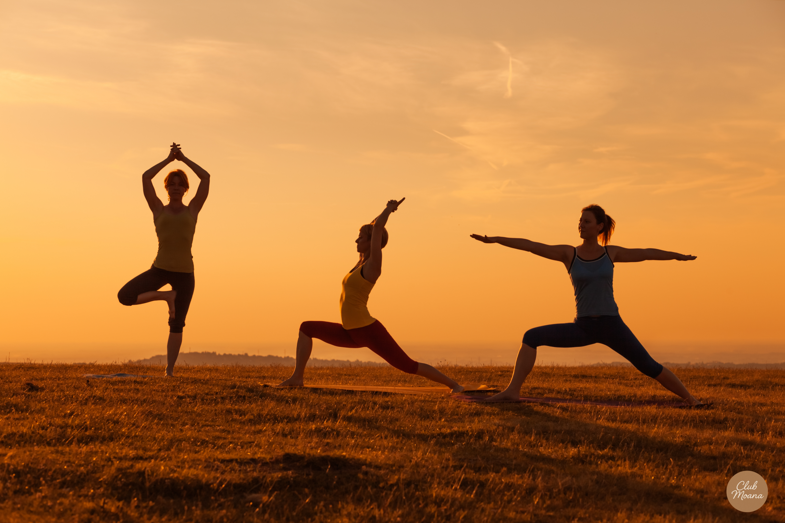 A happy, energetic person enjoying morning sunshine — representing a healthy immune system