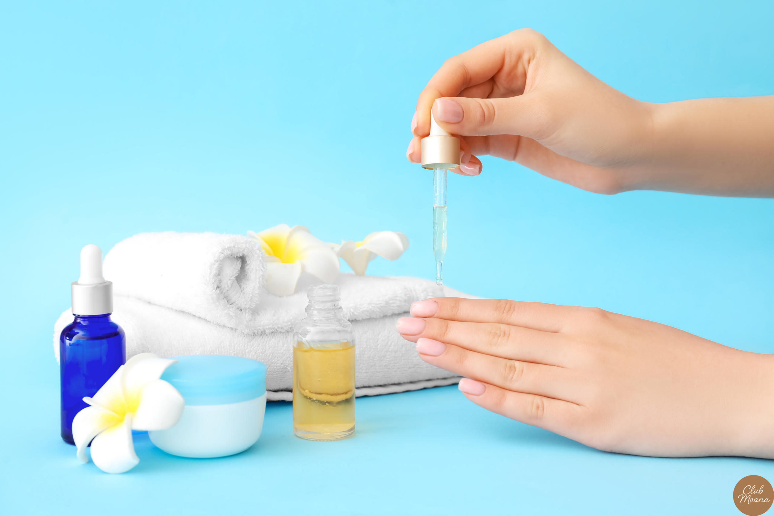 Happy user applying oil to nails with a soft towel 