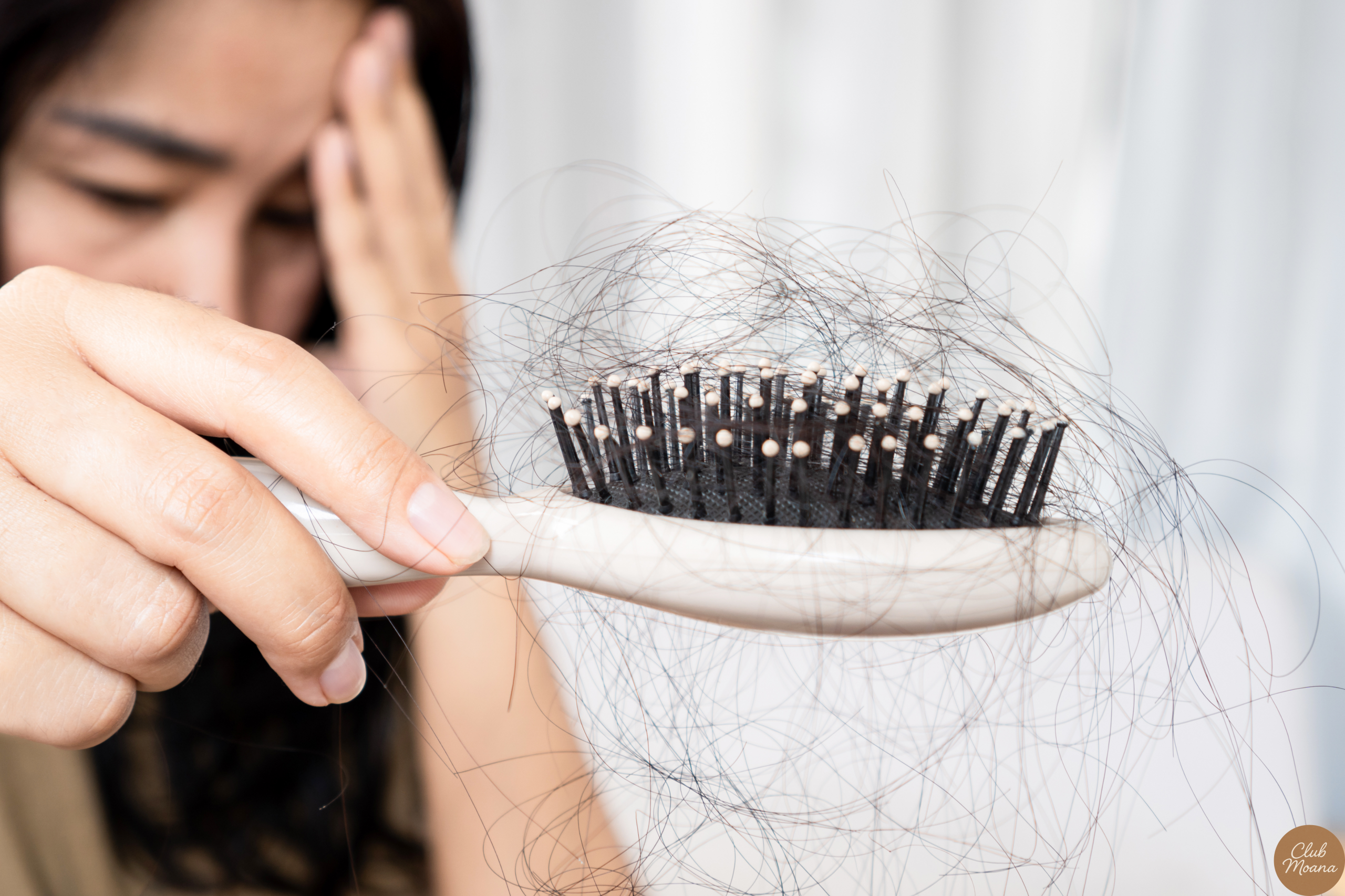 Visual of hair strands on pillow or in a brush