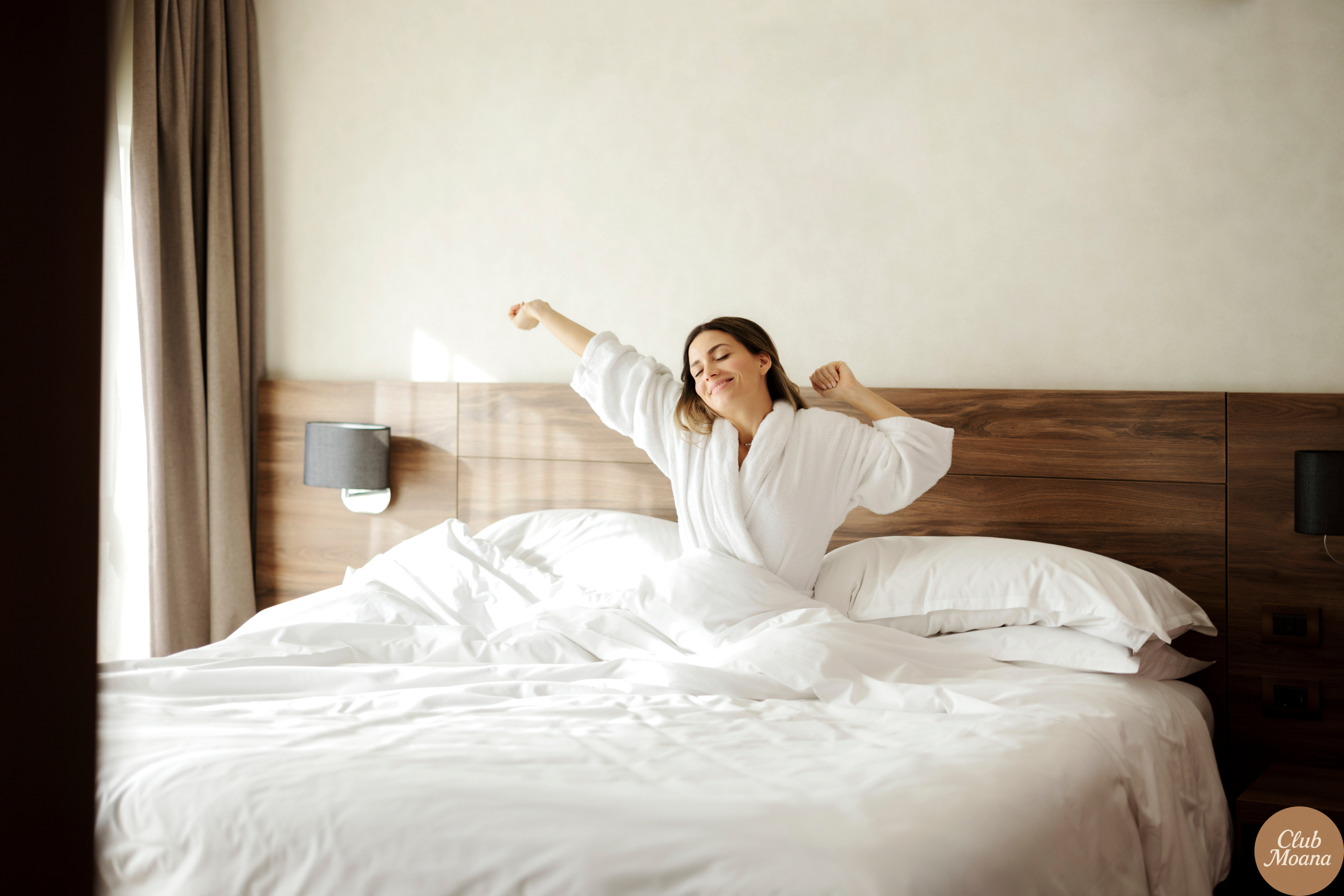 A motivating image of a man waking up early, stretching or getting ready for the day