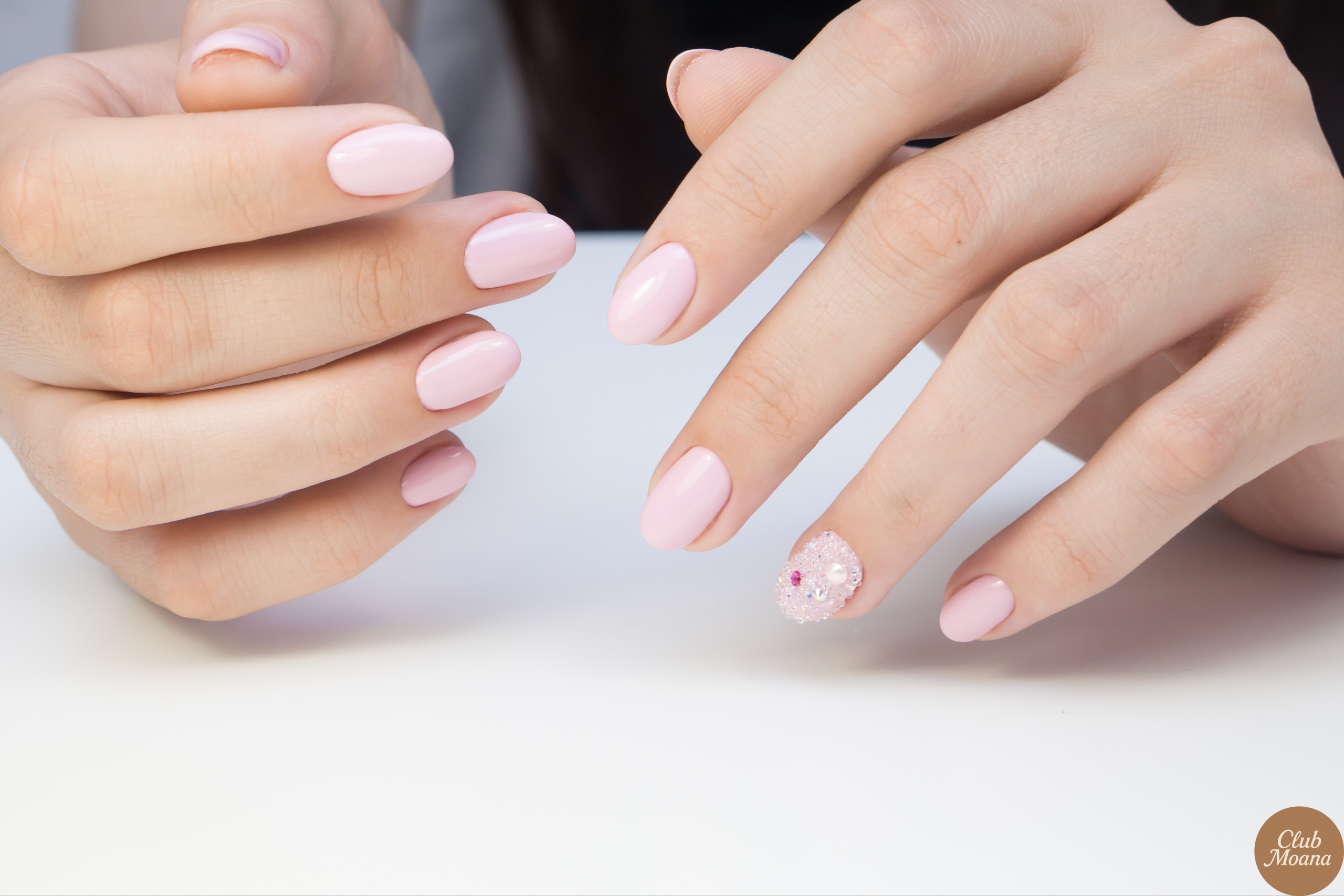 Close-up of grey or cream sweater texture nails