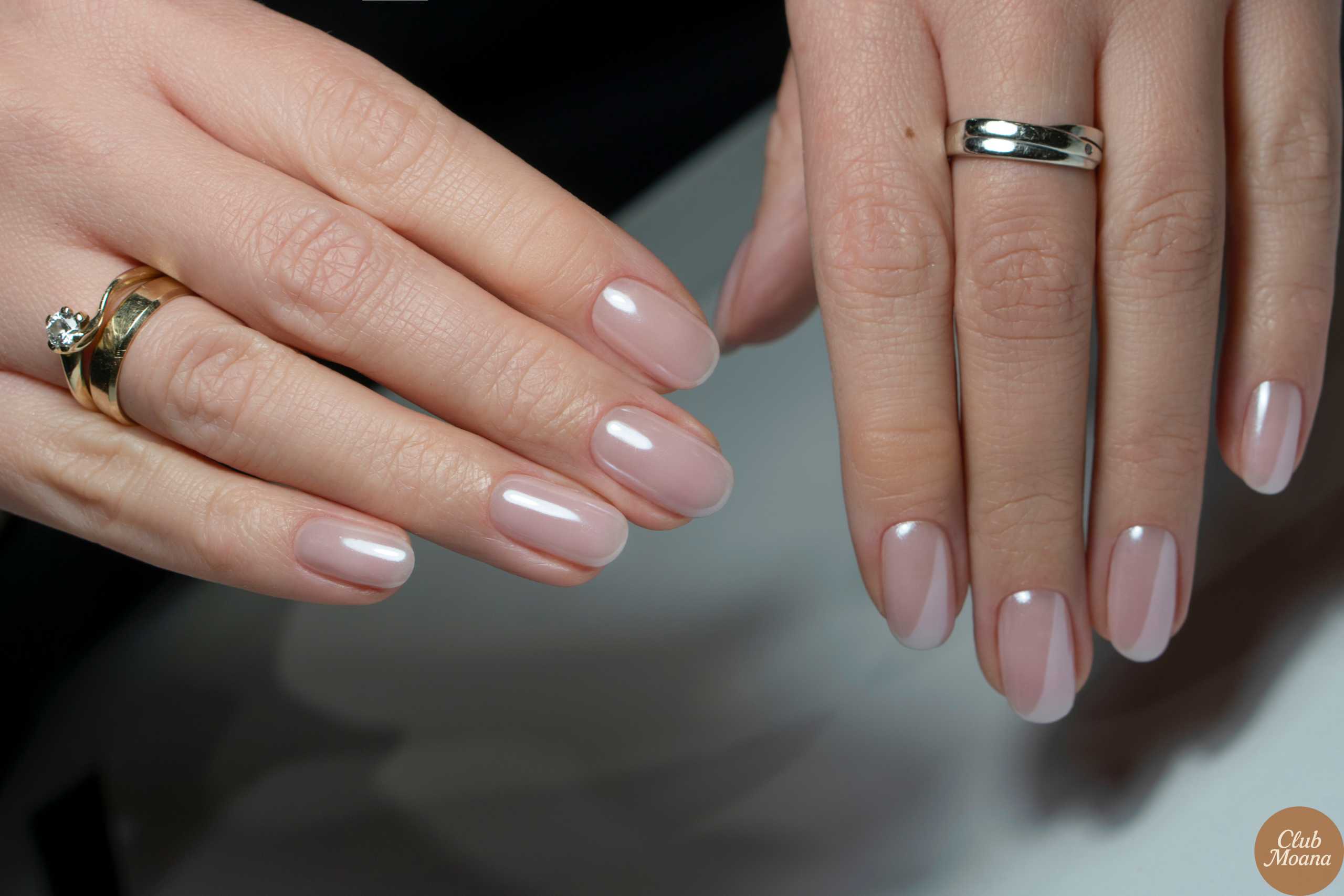 Close-up of silver French tips with glitter sparkle