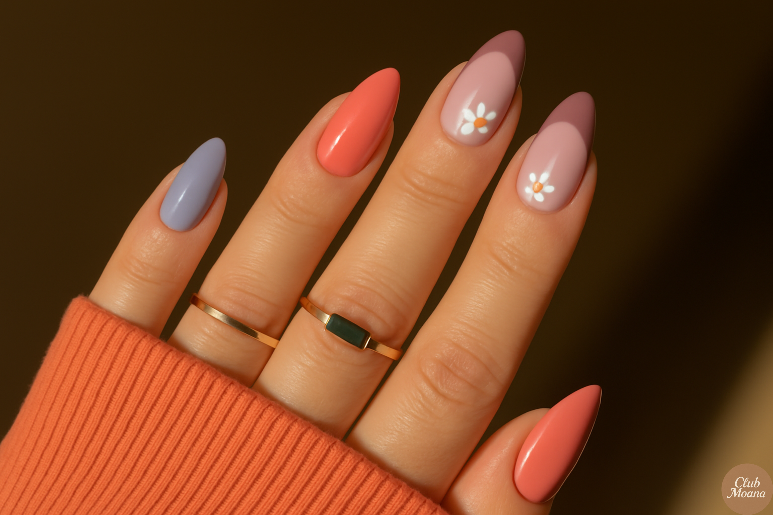 Micro French tips in different colors—orange, sky blue, and gold—on short nails