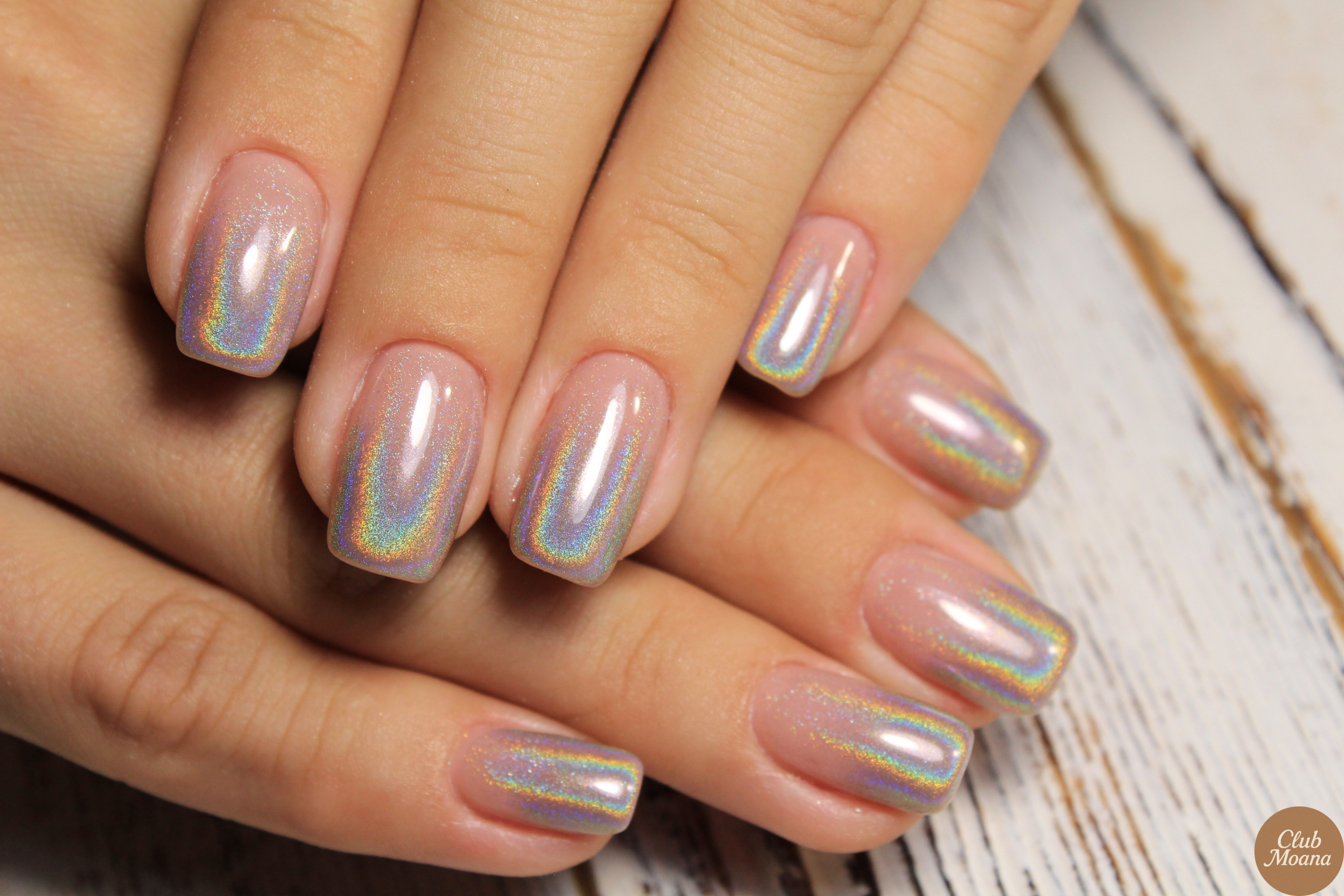 Nude nails with delicate gold foil flakes