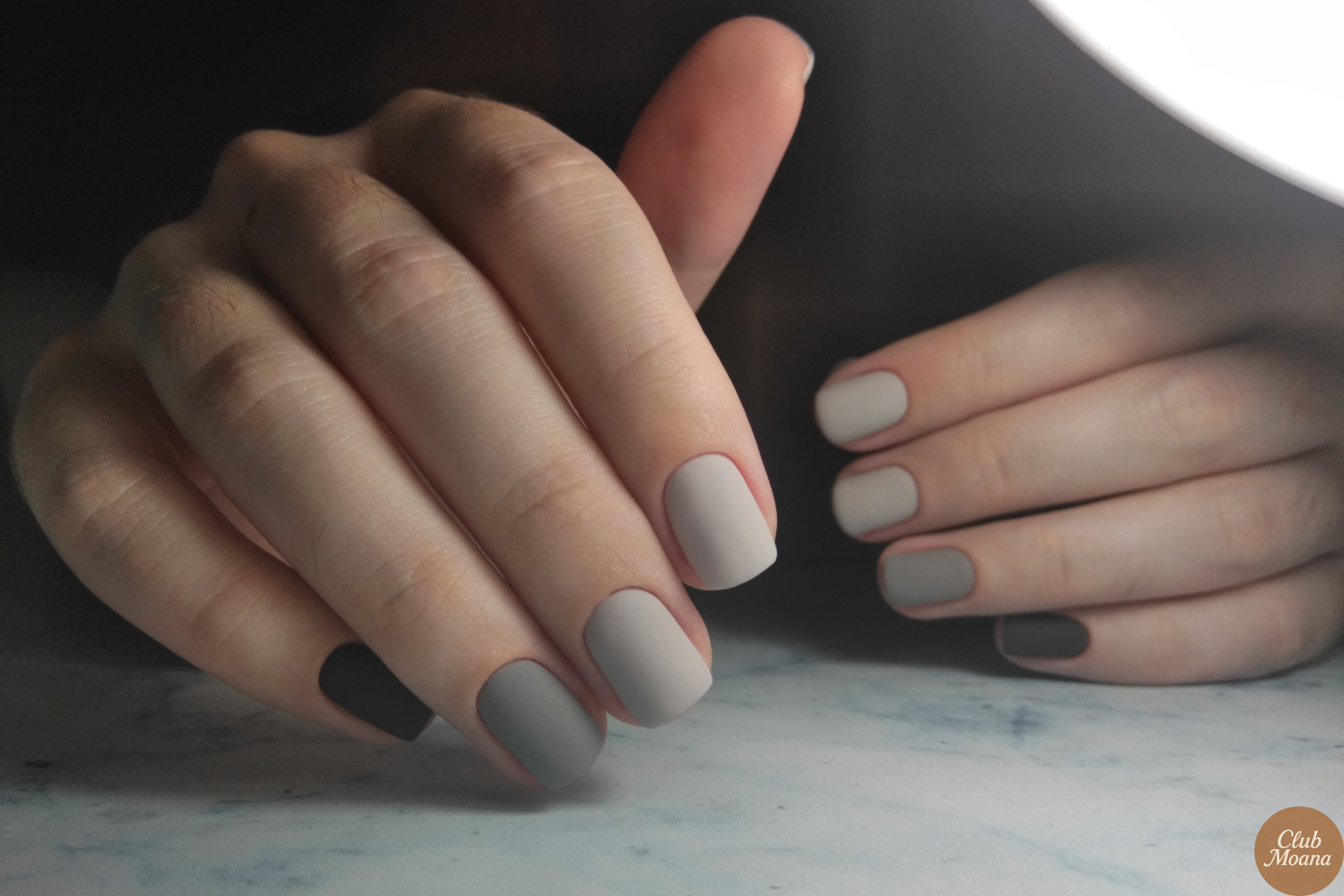 Pale gray nails with a matte finish